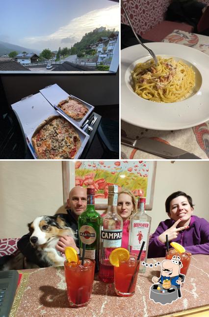Dai un’occhiata alla immagine che mostra la cibo e interni di Ristorante Pizzeria Des Alpes