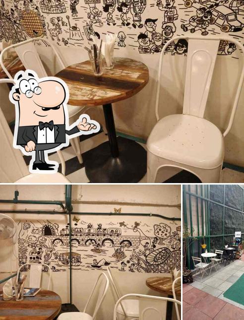 Take a seat at one of the tables at Cafe Grub Up