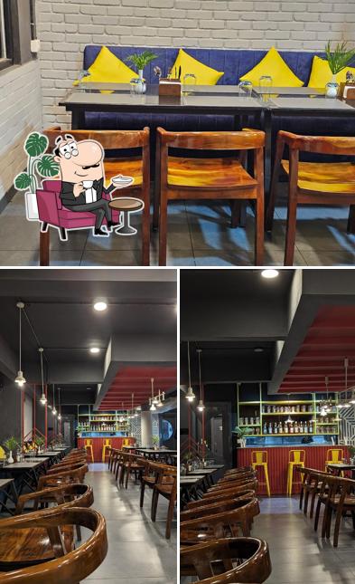 Take a seat at one of the tables at Mash Resto Café