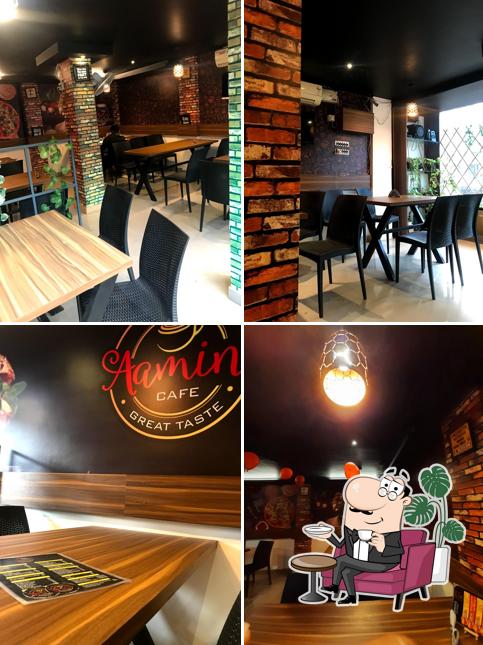 Take a seat at one of the tables at AAMINS CAFE
