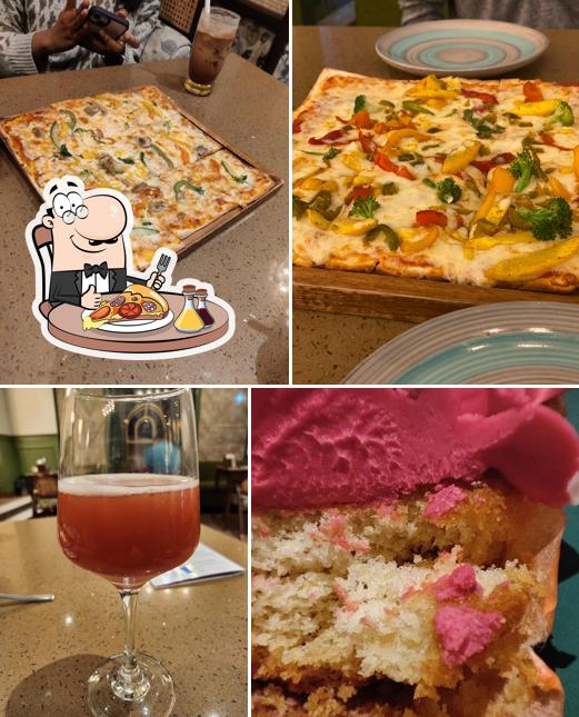 Try out pizza at CAFE RUKMA
