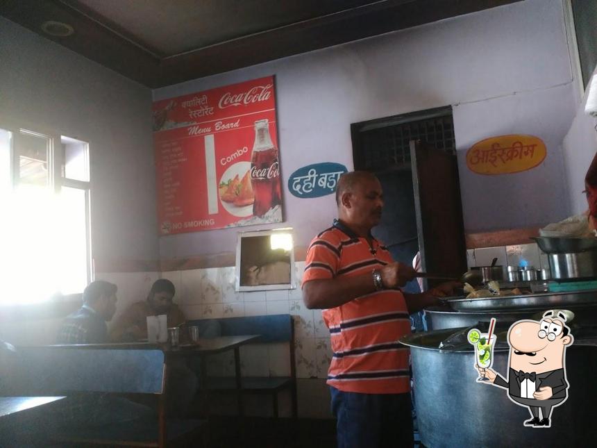 Enjoy a beverage at Qwality Restaurant