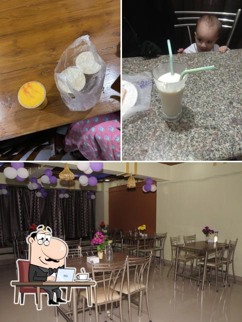 The photo of interior and dining table at Bombay Bandra Famous Faluda
