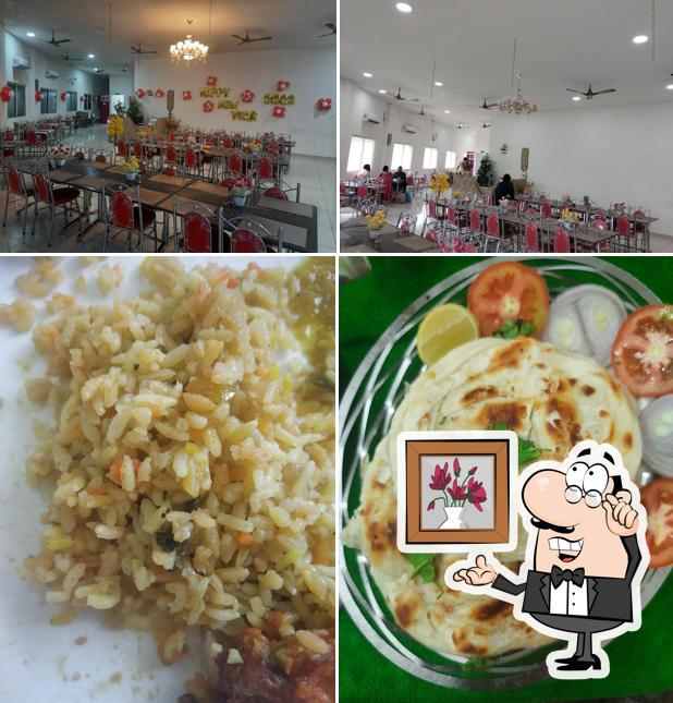 Check out the image depicting interior and food at SR Sultan Biriyani Original Impala