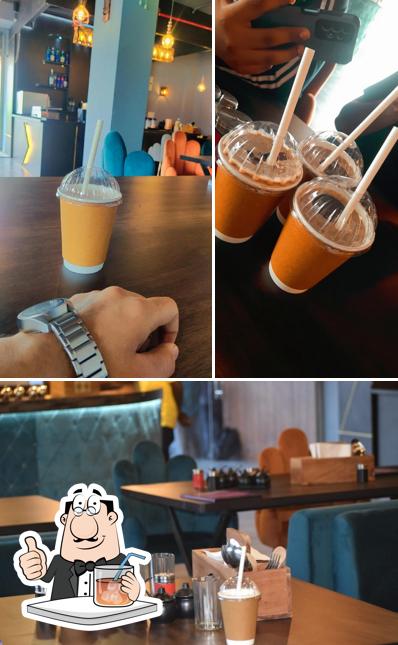 Check out the picture depicting drink and interior at Takshashila house