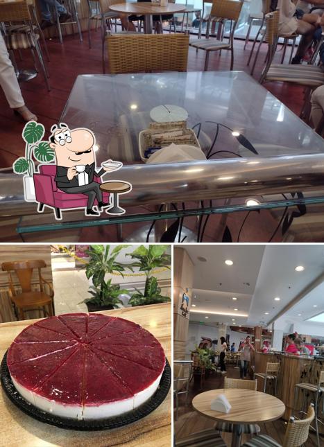 Esta é a imagem apresentando interior e mesa de jantar no Árabe Café