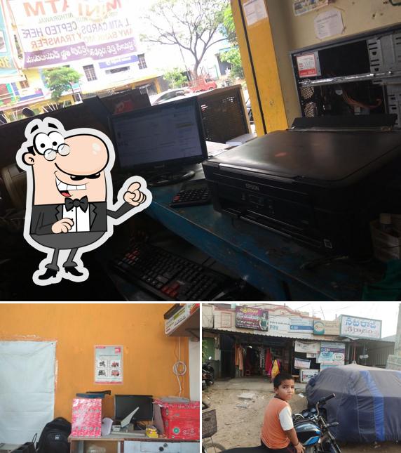 The image of interior and exterior at SUN NET MEESEVA. ADHAR CENTER LABOUR COLONY