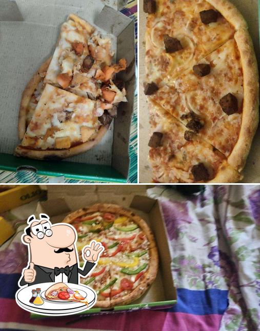 Pick pizza at Olio - The Wood Fired Pizzeria