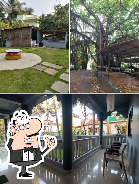 Take a look at the image displaying interior and exterior at SACRED FIG ART CAFE