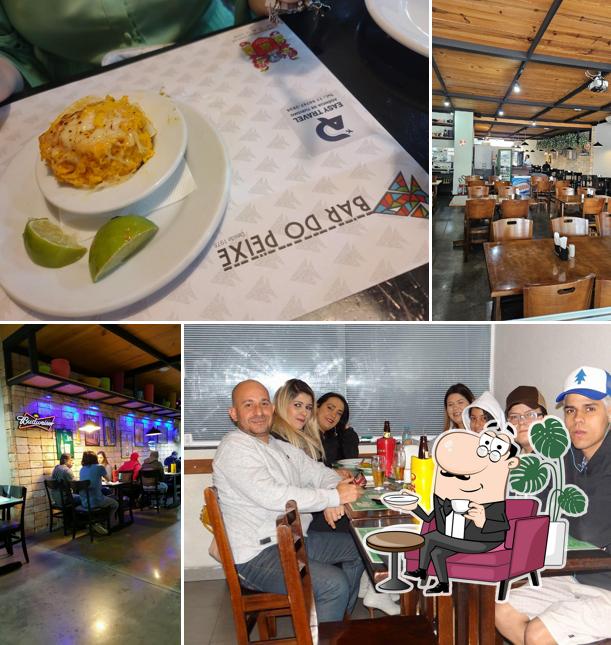 Sente em uma das mesas no Bar do Peixe
