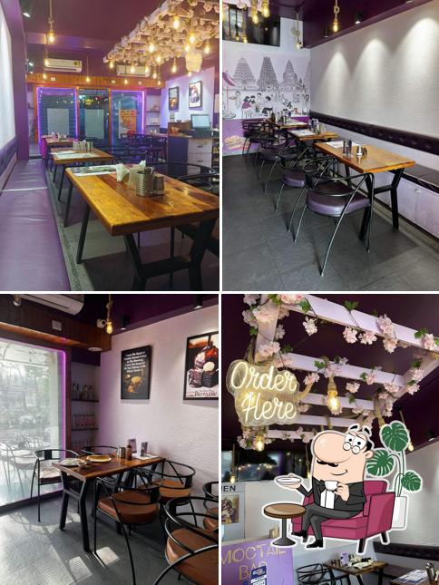 Take a seat at one of the tables at Lilac Cafe
