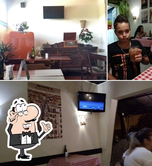O interior do Fratelli Pizzaria