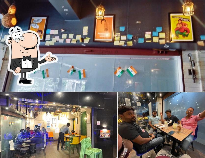 Take a seat at one of the tables at MOMO NATION CAFE (MNC)