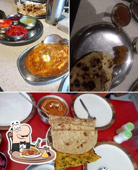 Try out pizza at NEW PAUL BHOJNALYA