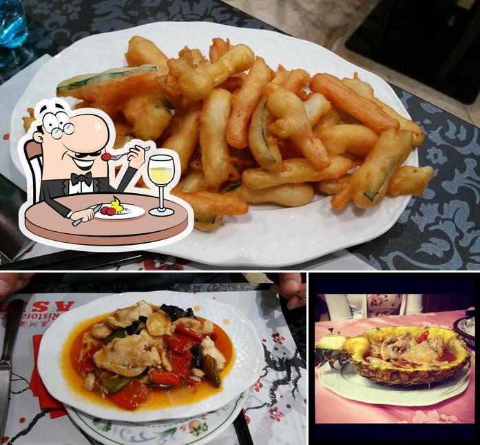 Guarda la foto che mostra la cibo e tavolo da pranzo di Ristorante Cinese Asia（Ristorante Asia）