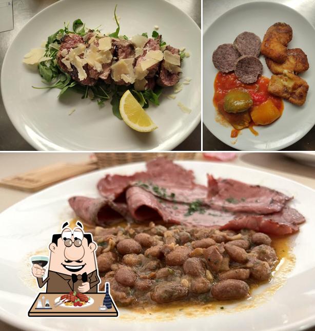 Ordina i piatti di carne a Ristorante Osteria Del Villaggio