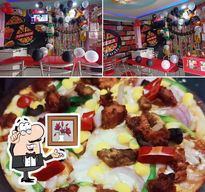 This is the picture depicting interior and food at Pizza Crush