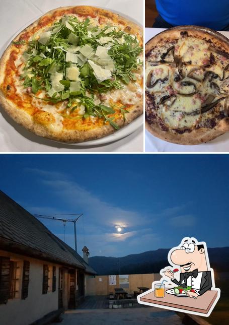 Dai un’occhiata alla foto che raffigura la cibo e esterno di Pizzeria Europa