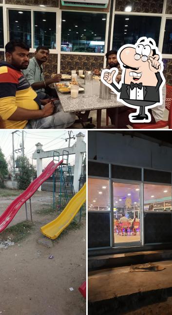 The Bavla-51 Lake View Restaurant. is distinguished by interior and play area
