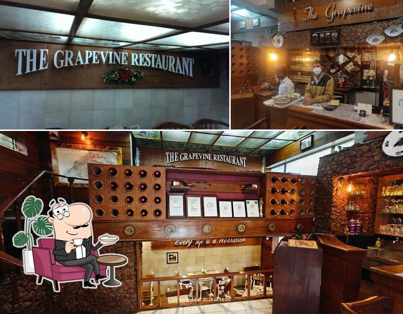 Check out the image showing interior and bar counter at The Grapevine Restaurant