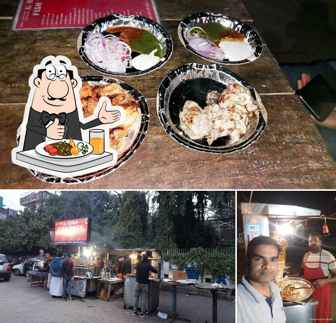Take a look at the image displaying food and interior at Al Rahman Chicken Shop