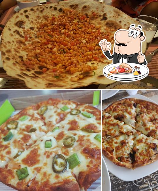 Get pizza at Copper Chimney