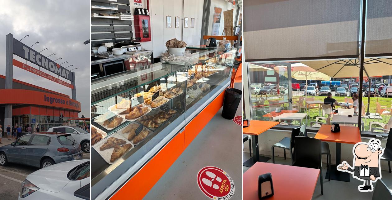 Dai un'occhiata agli interni di Cubotondo Café
