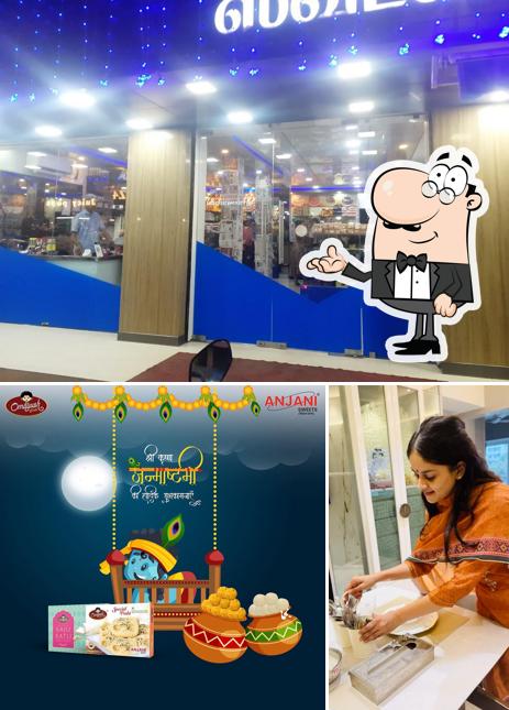 Take a seat at one of the tables at Anjali Sweets and Cakes