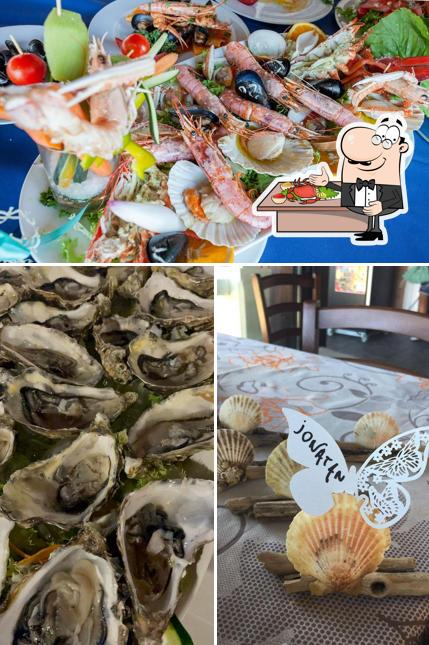 Prenditi la cucina di mare a Bahari Cafè