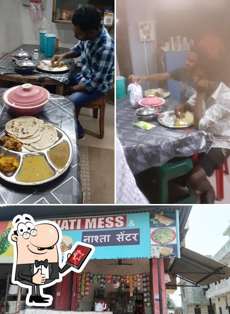 Look at the photo of Swathi Tiffin Center & Mess