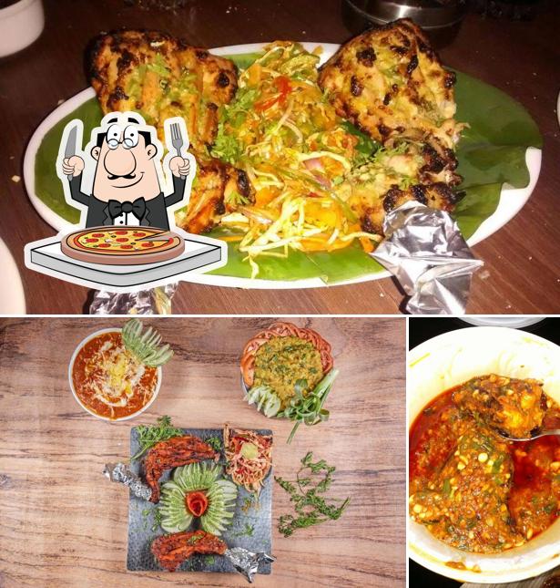 Pick pizza at HOTEL VEER PARK