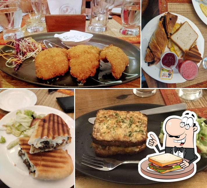 Order a sandwich at Les Saveurs
