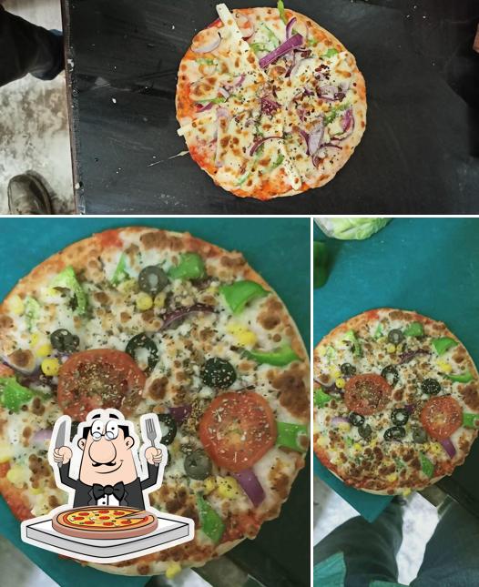 Get pizza at Maa Kali Bakery and Fast Food