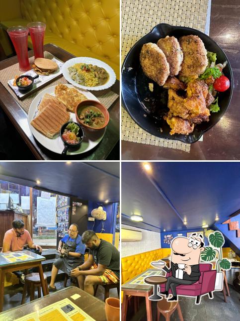 This is the image depicting interior and food at Rolly's