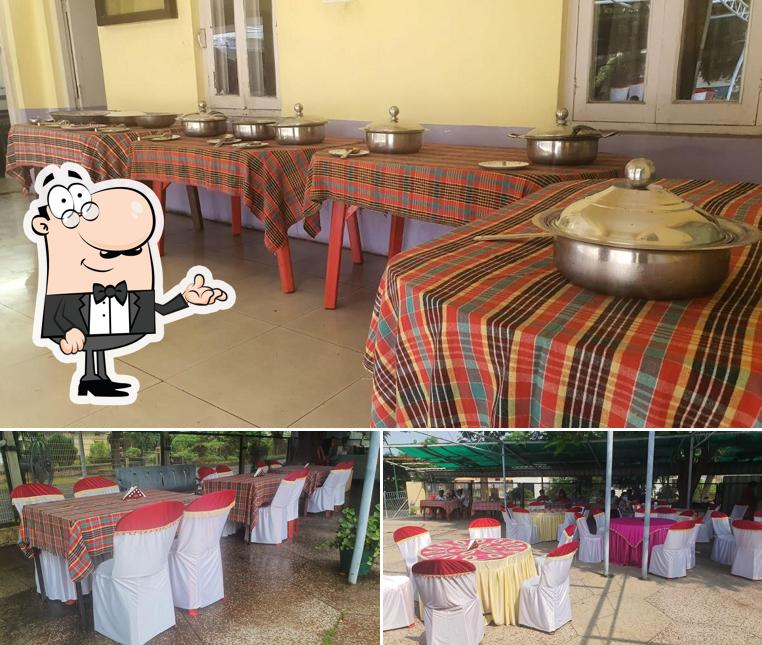 Take a seat at one of the tables at Utmal Club, North Club