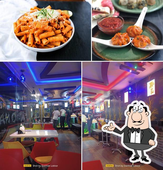 This is the photo depicting interior and food at MOMO NATION CAFE