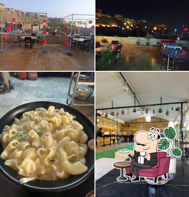 Take a look at the picture depicting interior and food at Mannat cafe