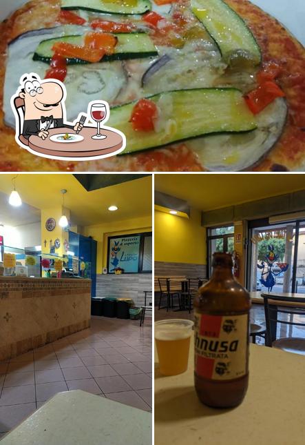 Questa è la immagine che mostra la cibo e interni di La Tana del Lupo