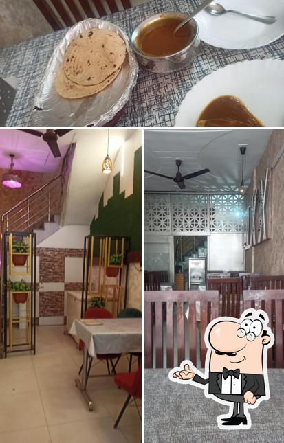 Check out the image showing interior and food at Seven Eleven Restaurant