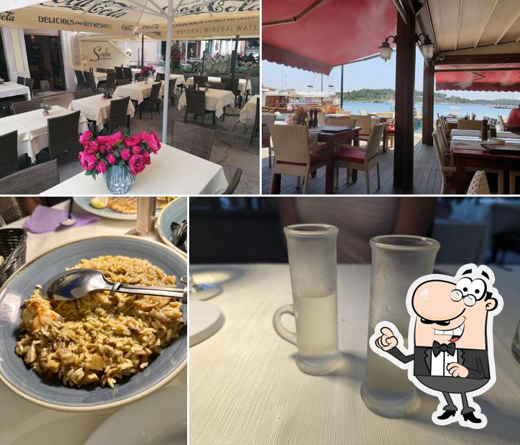 Dai un'occhiata agli interni di Scuba restaurant