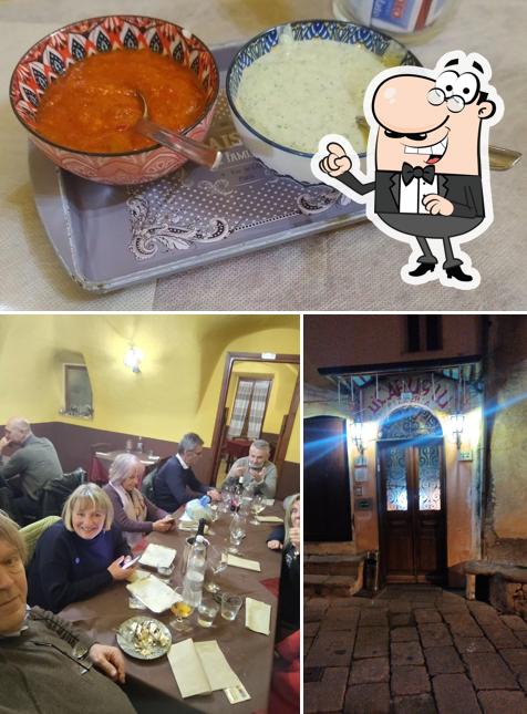 La foto della interni e cibo di Pizzeria U Carugiu
