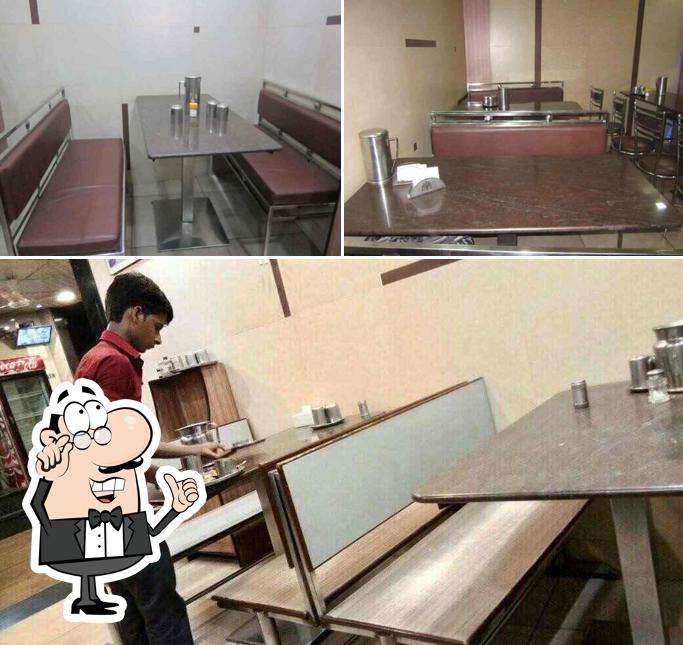 Take a seat at one of the tables at Punjabi Dhaba