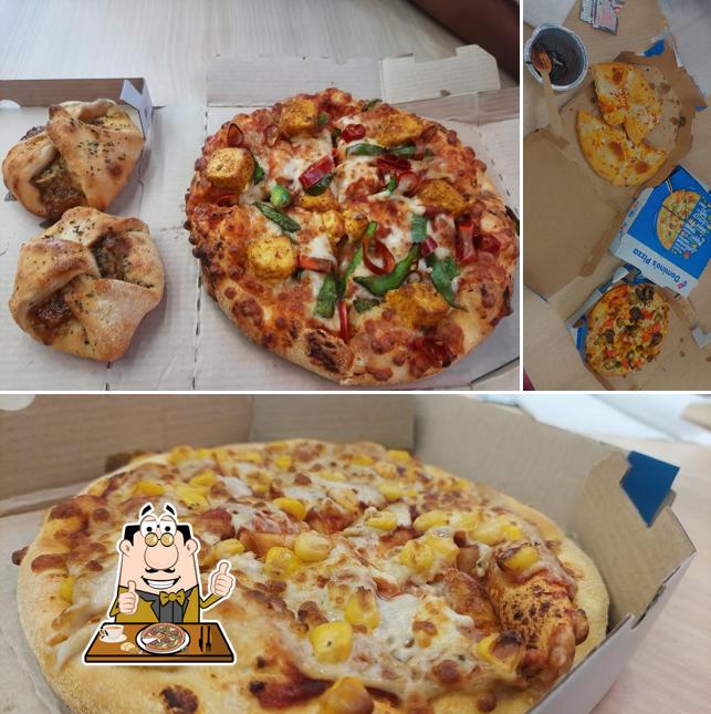 Try out pizza at Domino's Pizza Vinoba Nagara, Davanagere City