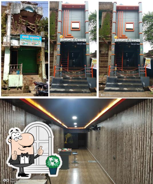 Take a look at the image displaying exterior and interior at Yummy Foods