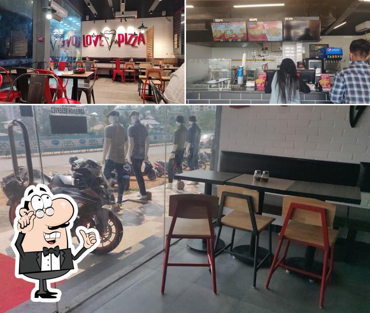 Check out how Pizza Hut Seaport Airport Road Kakkanad, Kochi looks inside