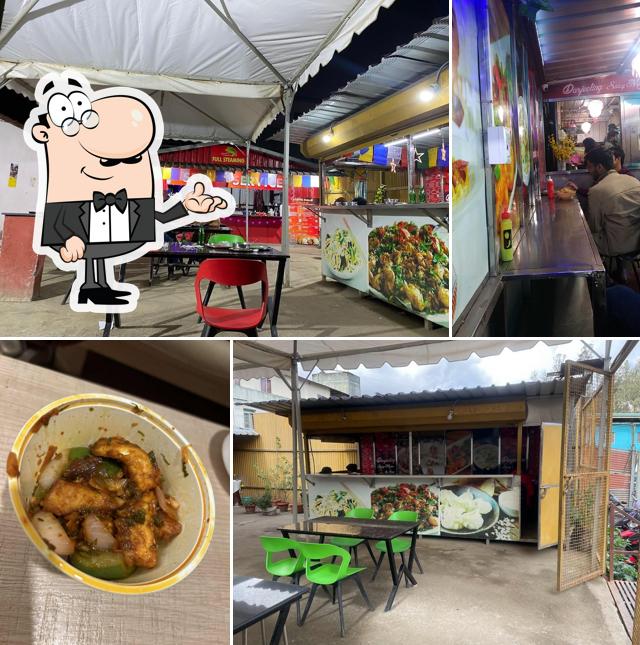 Take a seat at one of the tables at Darjeeling Spicy Momo Ooty