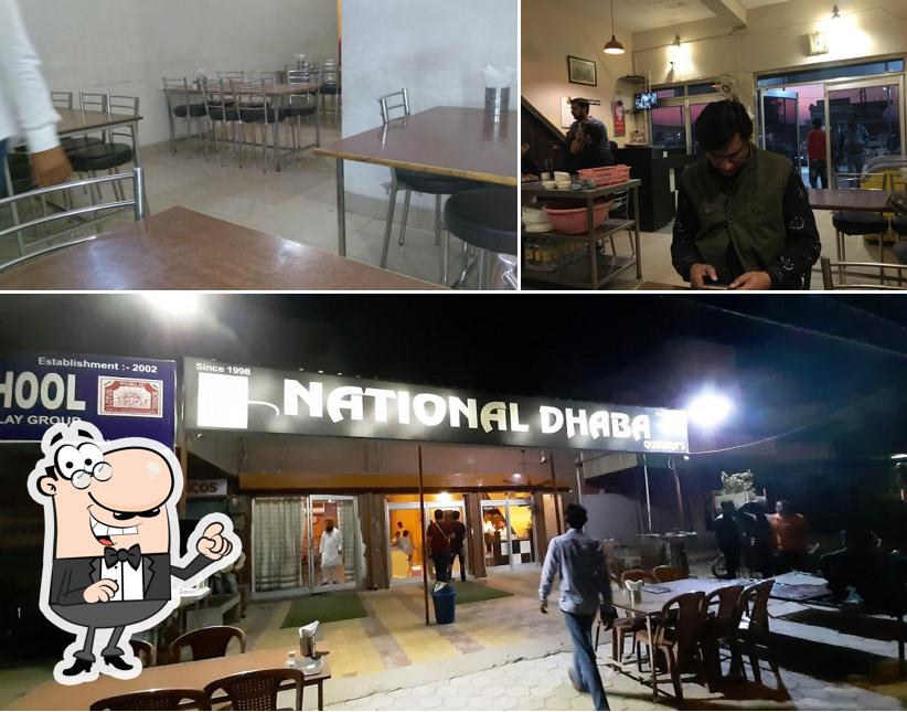 Take a seat at one of the tables at National Dhaba & Hotel