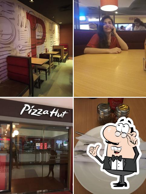 The interior of Pizza Hut Phoenix United Mall, Bareilly The interior of Pizza Hut Phoenix United Mall, Bareilly