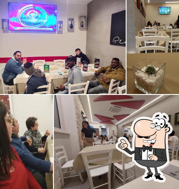 Dai un'occhiata agli interni di Pizzeria Red Lion'S