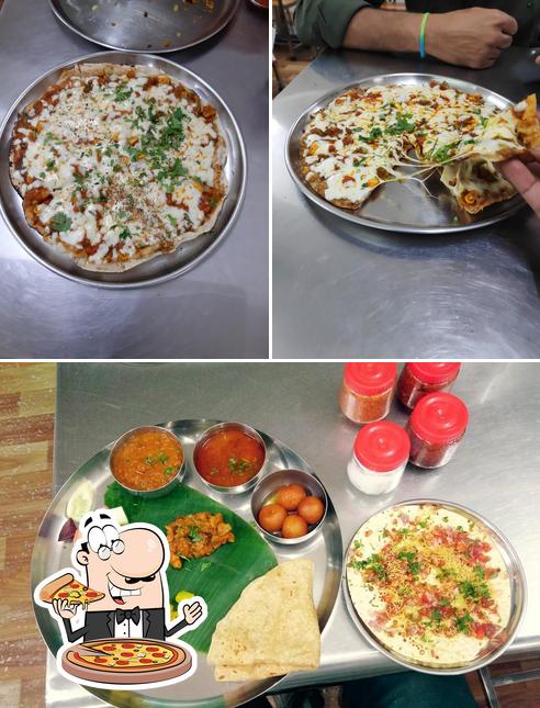 Pick pizza at Vasant Bhojanalay Satara